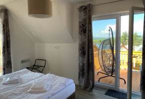 Bedroom 2 with view on Lipno Lake